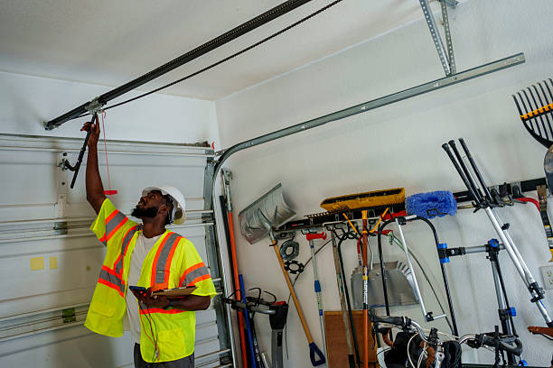 Professional Garage Door Panel Replacement technician working in Waupun, WI